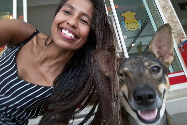 Sarimah with a stray dog