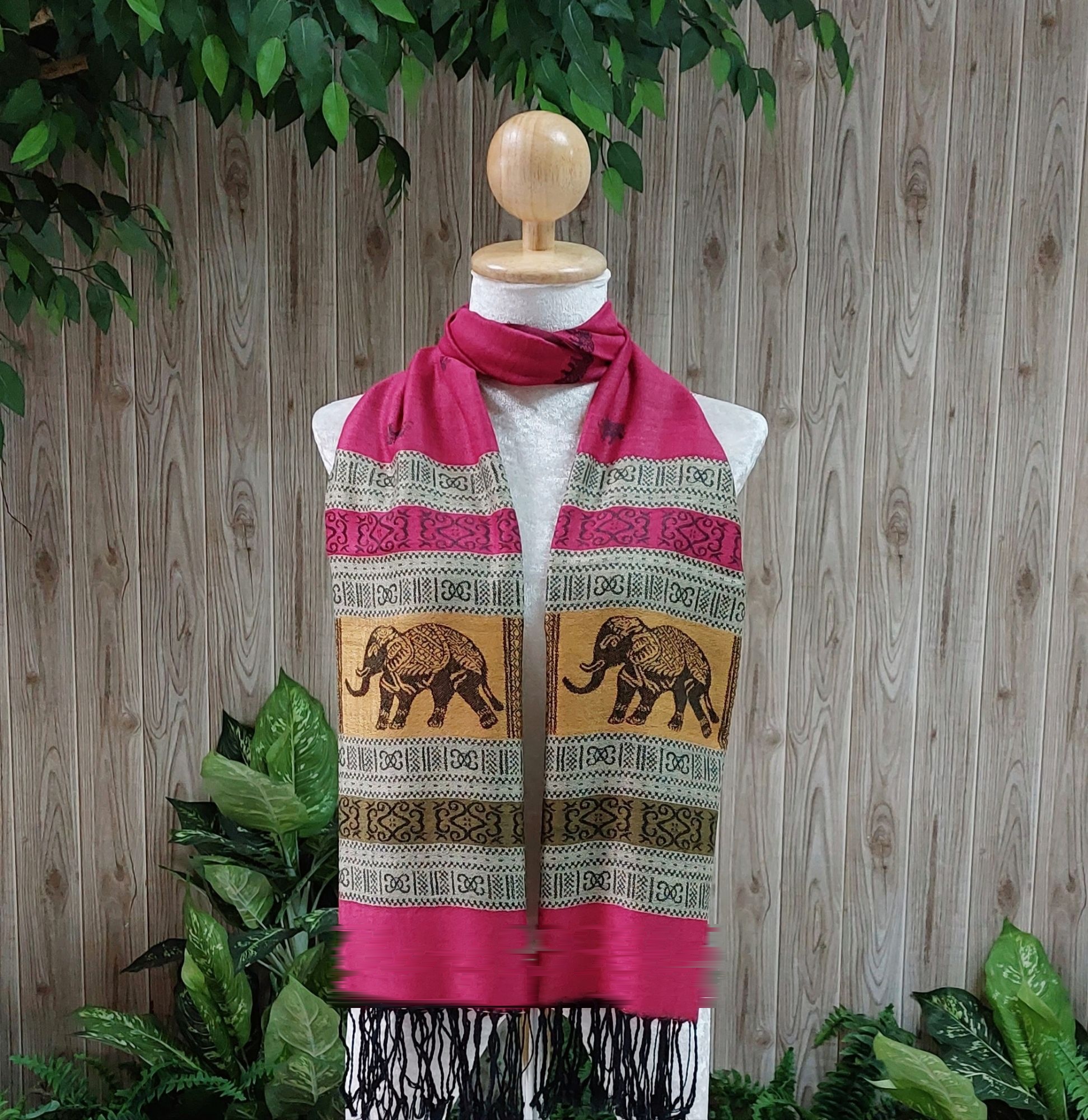 Elephant silk shawl in magenta pink on a mannequin