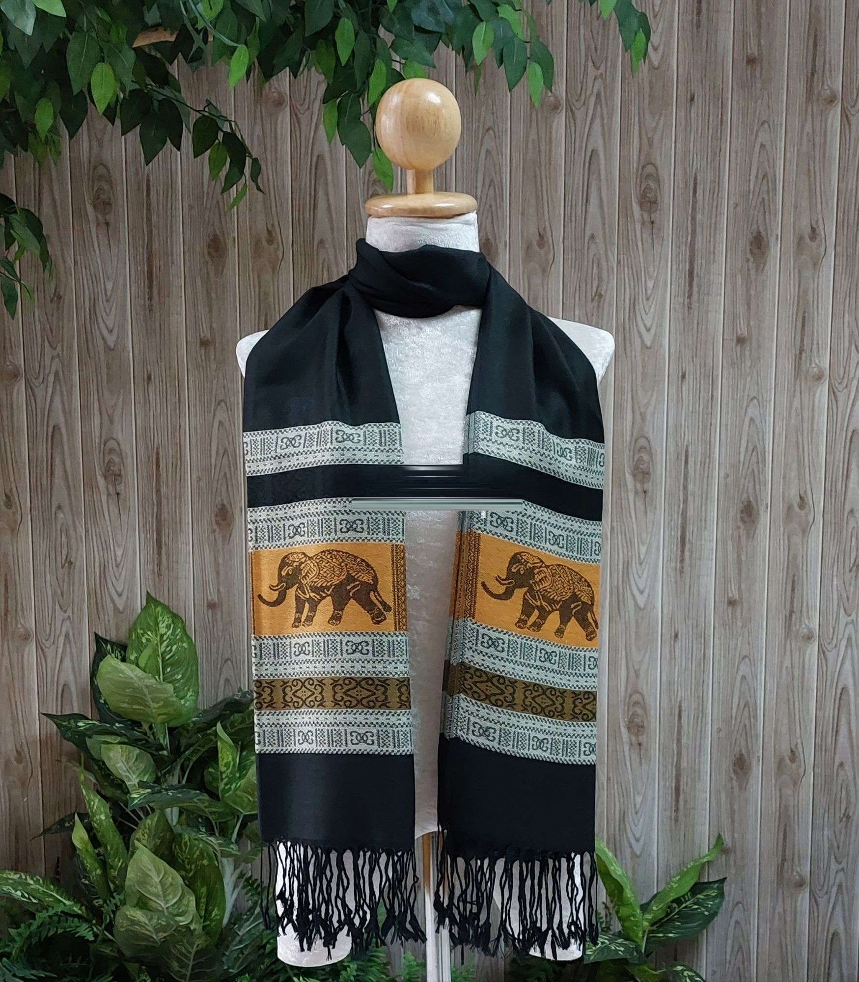 Elephant silk shawl in black on a mannequin