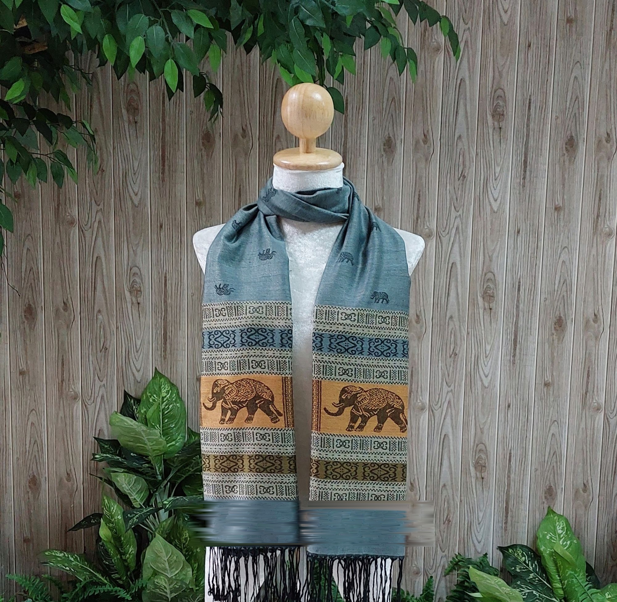 Elephant silk shawl in steel blue on a mannequin