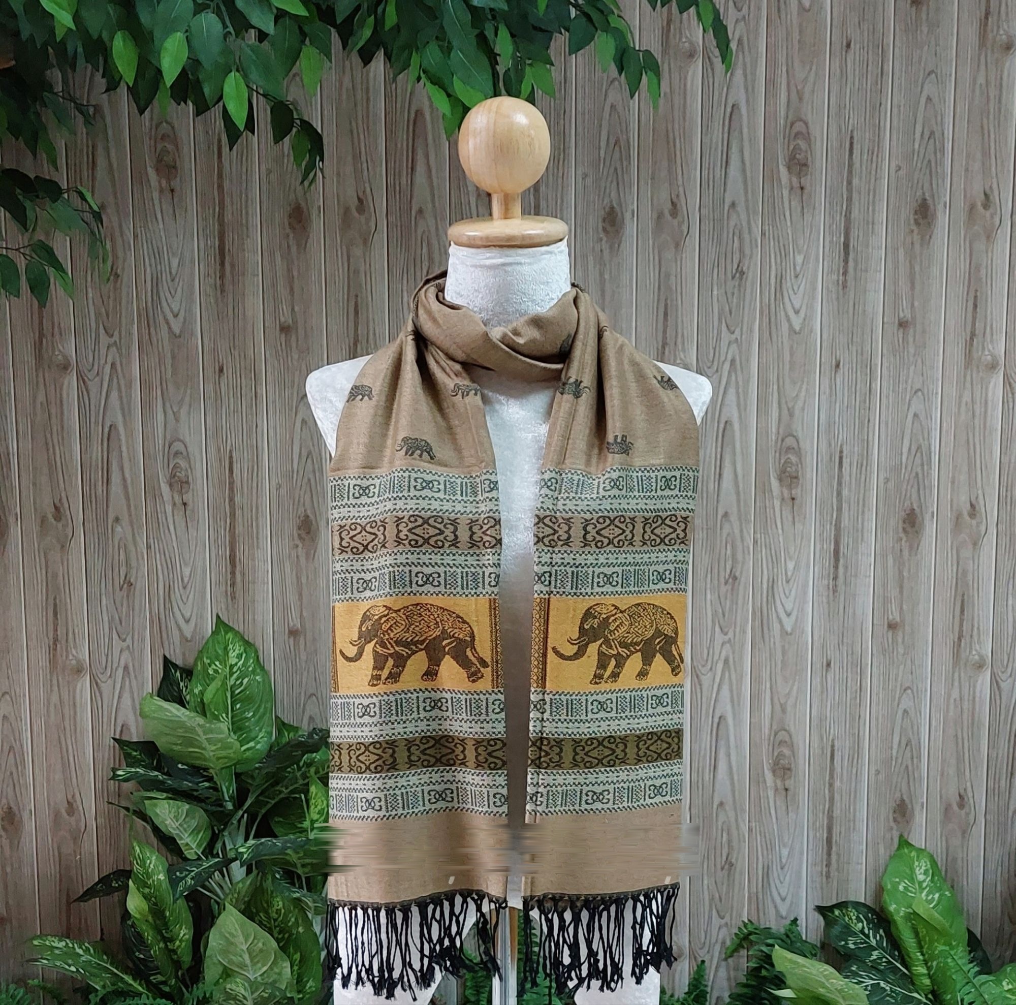 Elephant silk shawl in warm taupe on a mannequin