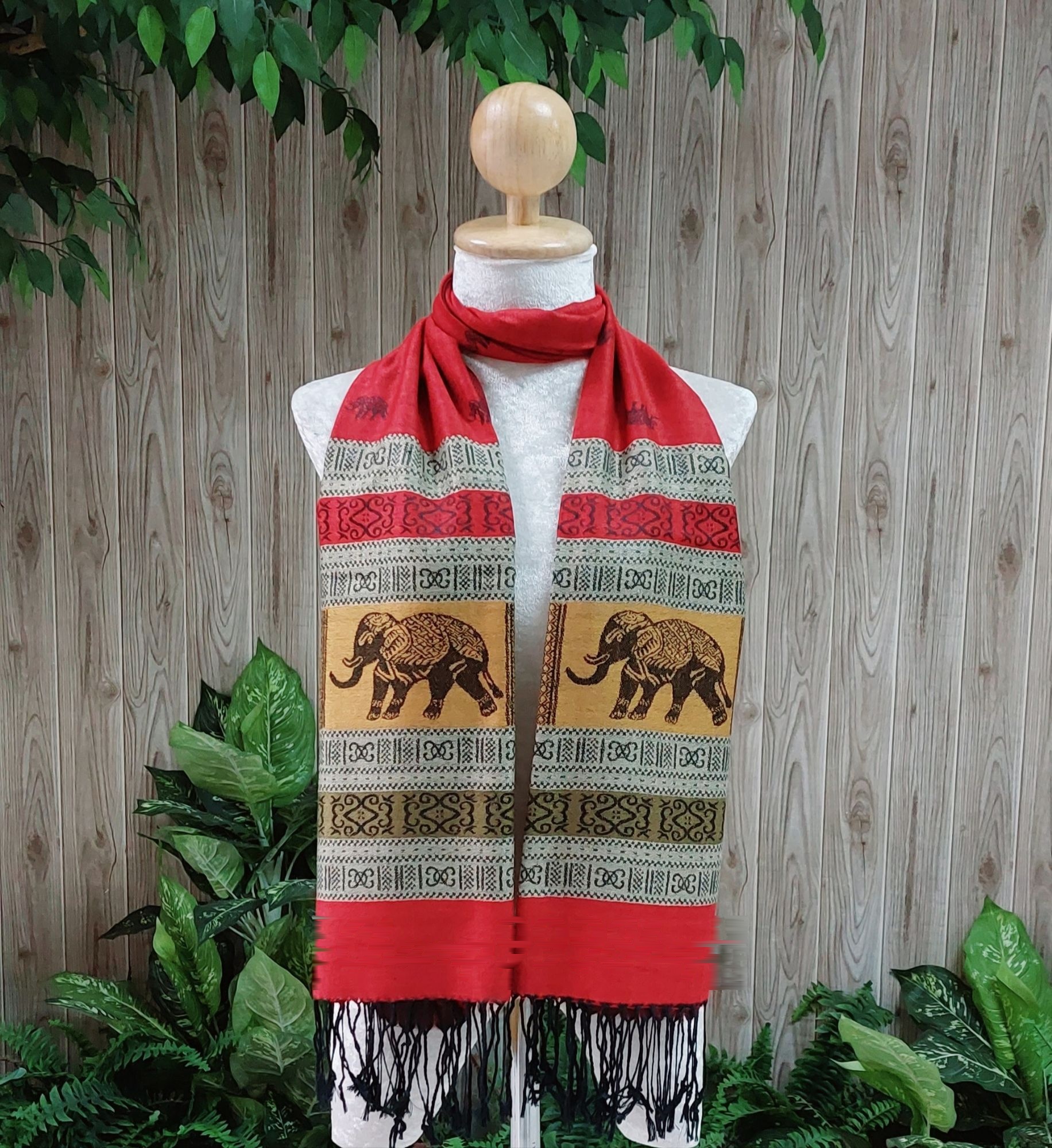 Elephant silk shawl in red on a mannequin