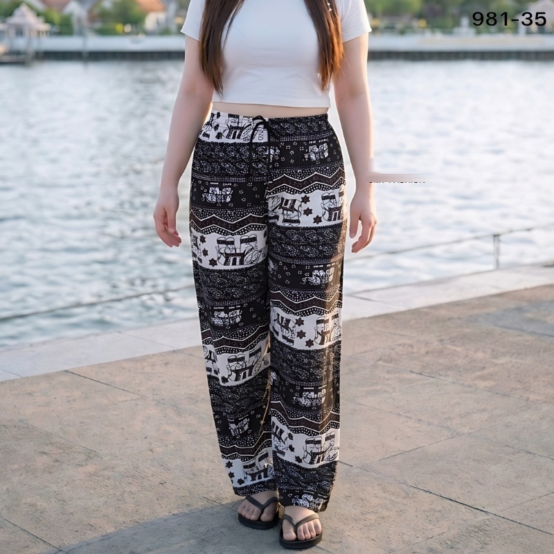Elephant print trousers in black and white
