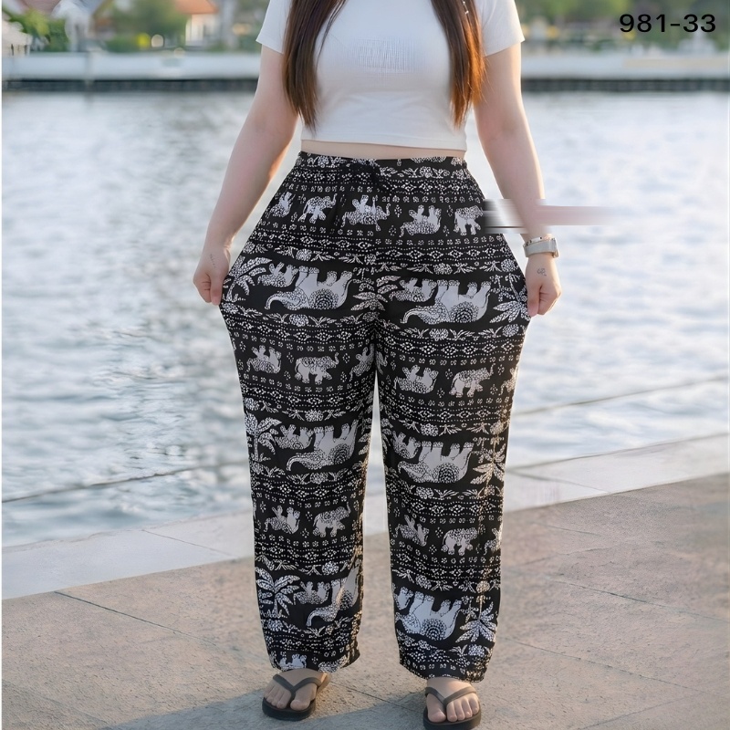 Elephant print trousers in bold black and white