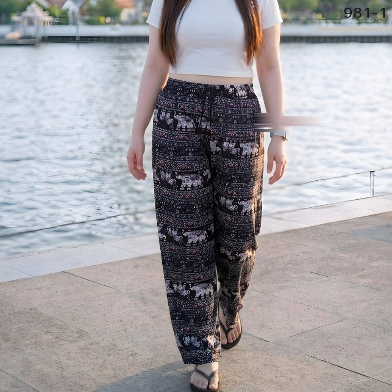 Elephant print trousers in black with blush pink detail