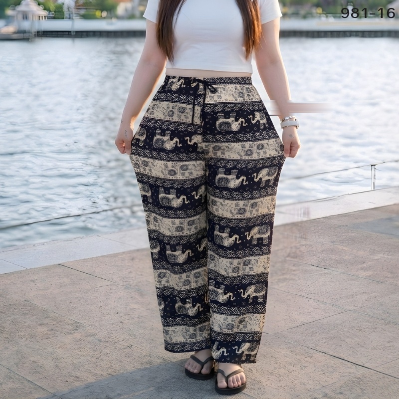 Elephant print trousers in navy and sand