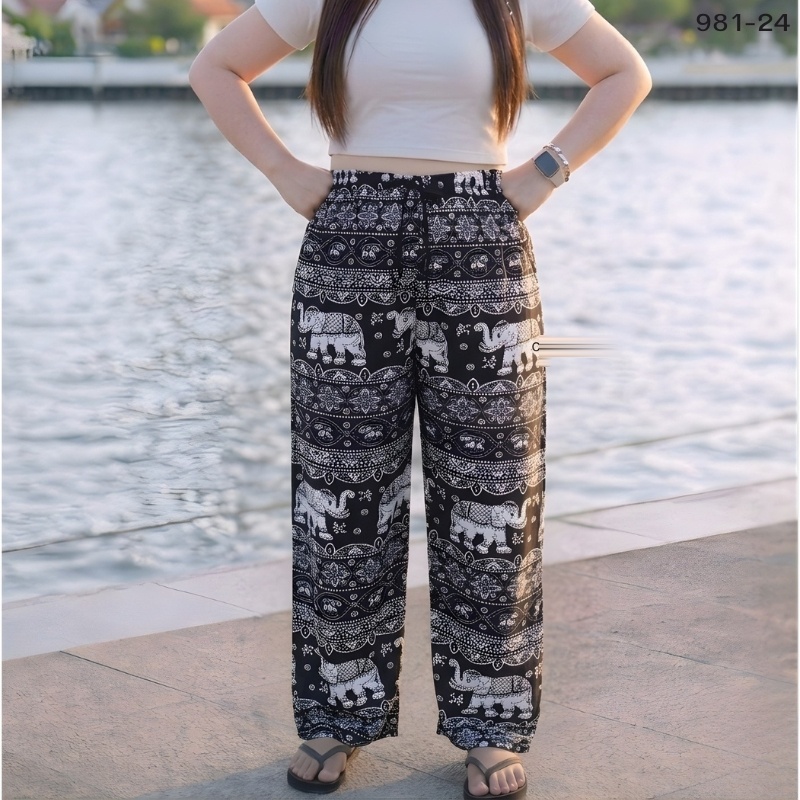 Elephant print trousers in navy and cream elephant pattern